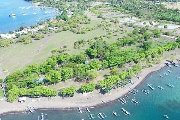 Tanah Pinggir Pantai Sebelah Bandar Udara Letkol Wisnu Sumberkima